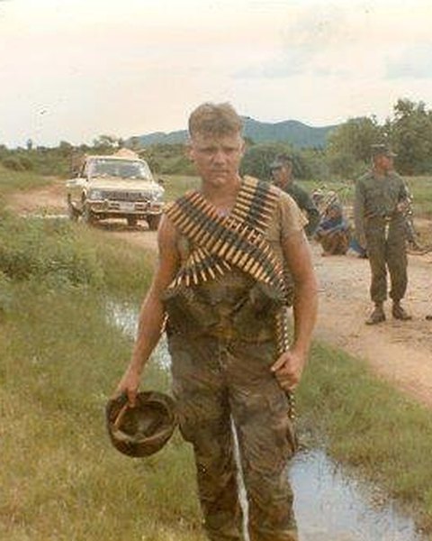 Will Power as a young Marine in Thailand in 1985, carrying belts of .50 caliber rounds