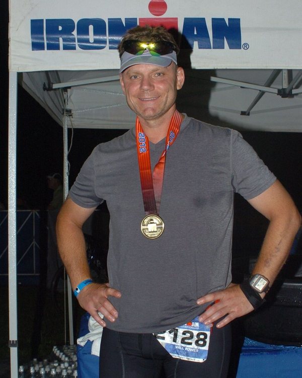 Will Power wearing an Ironman finisher medal